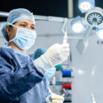 Surgeon,Preparing,Anaesthesia,Syringe,Or,Injection,For,Surgery,At,Operation