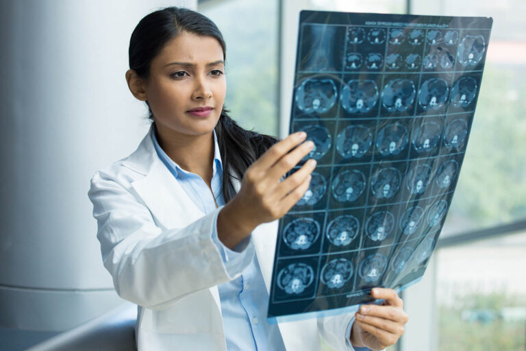 Closeup,Portrait,Of,Intellectual,Woman,Healthcare,Personnel,With,White,Labcoat,