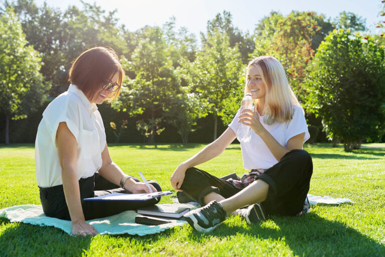Female,Teacher,Psychologist,Social,Worker,Talking,To,Teenage,Student,On