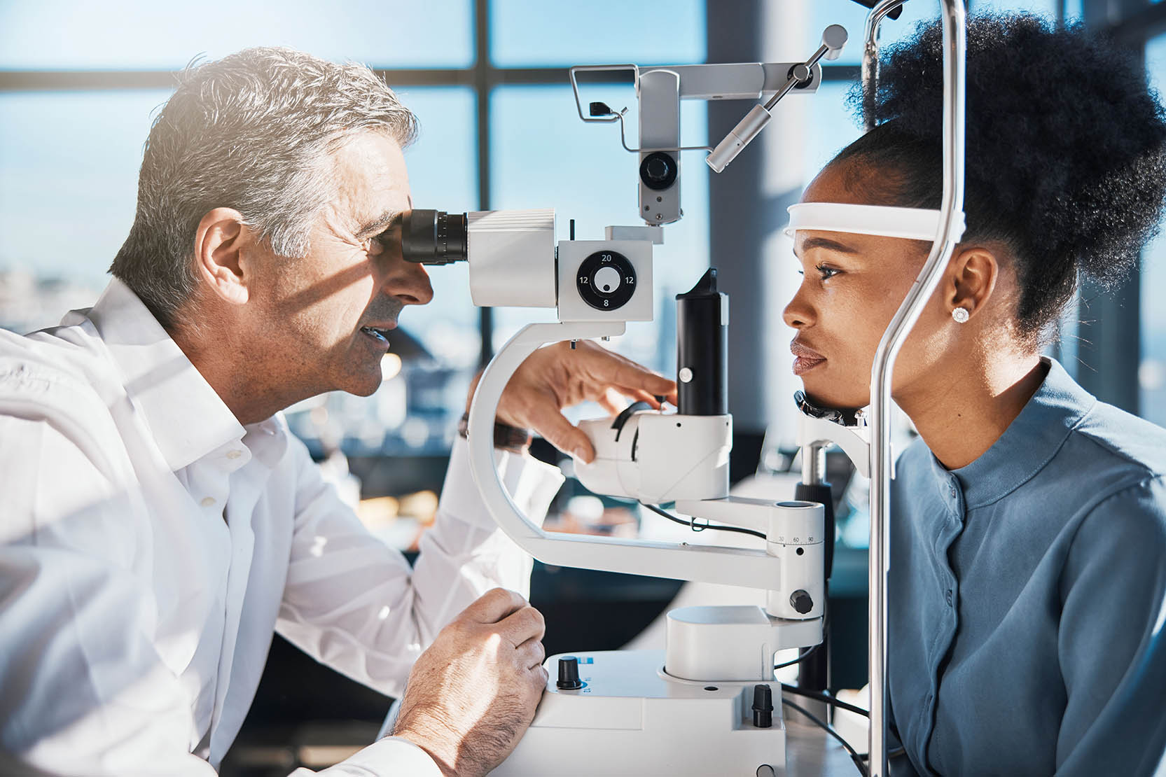 Test,,Eye,Exam,Or,Black,Woman,Consulting,Doctor,For,Eyesight