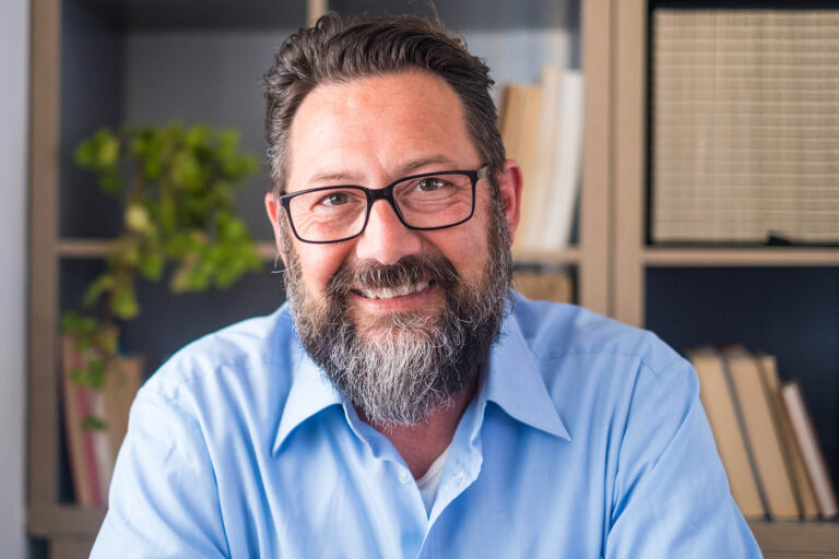 Portrait,Of,One,Young,And,Happy,Cheerful,Man,Smiling,Looking