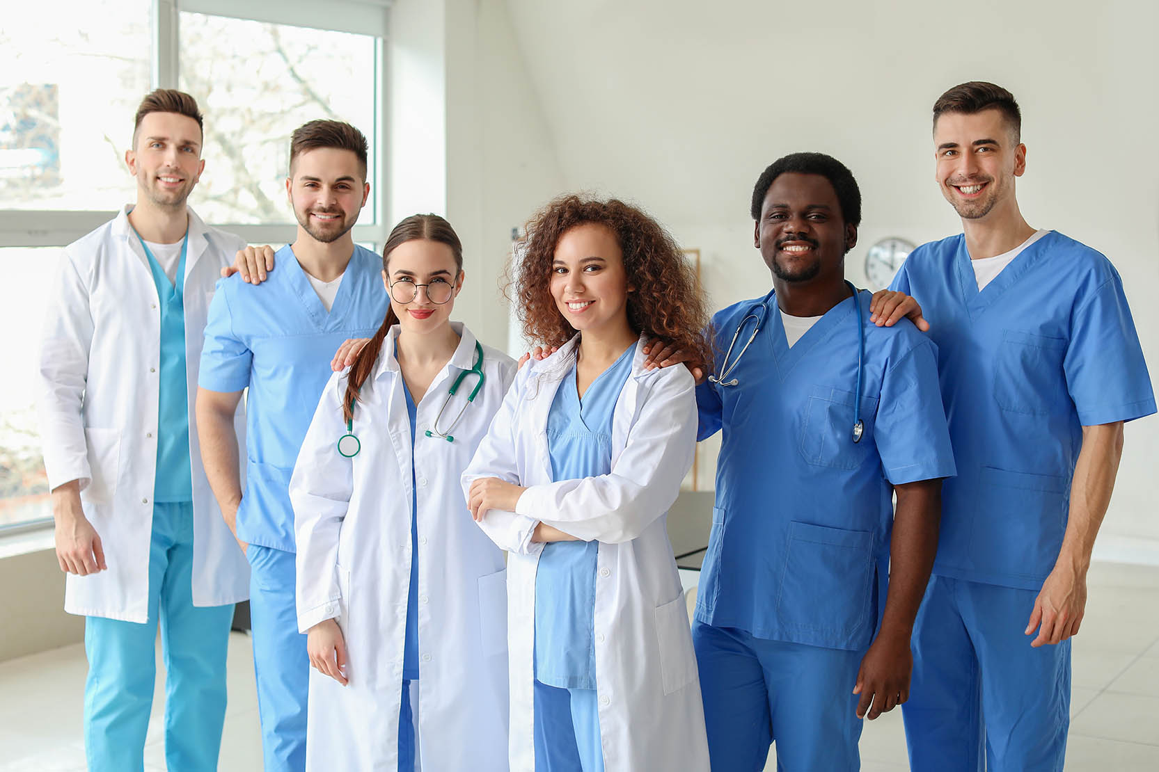 Group,Of,Doctors,In,Clinic.,Unity,Concept