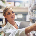 Medicine,,Woman,Pharmacist,With,Tablet,And,Looking,For,Prescription,In