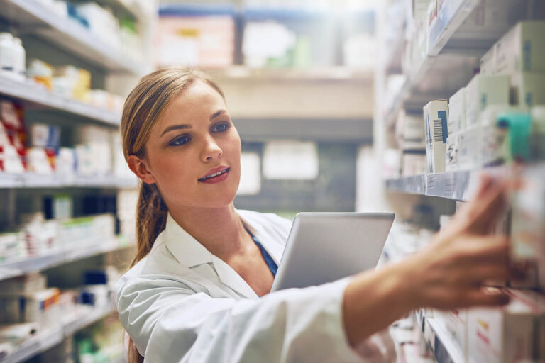 Medicine,,Woman,Pharmacist,With,Tablet,And,Looking,For,Prescription,In