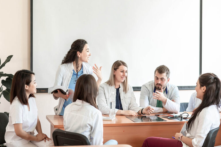 Group,Of,Medical,Students,Studying,In,Classroom.,Consultation,Of,Young