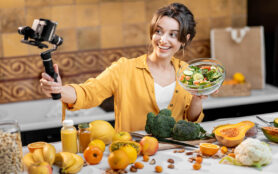 Young,And,Cheerful,Woman,Vlogging,On,Mobile,Phone,About,Healthy