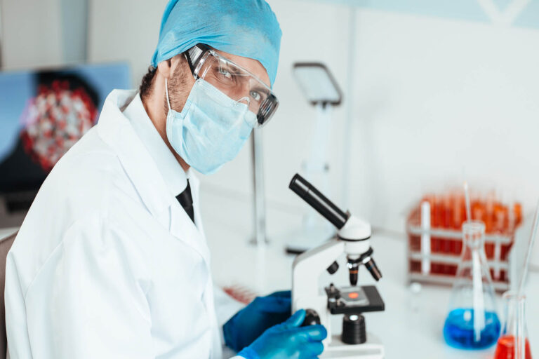 Talented,Scientist,Sitting,At,A,Table,In,The,Laboratory.